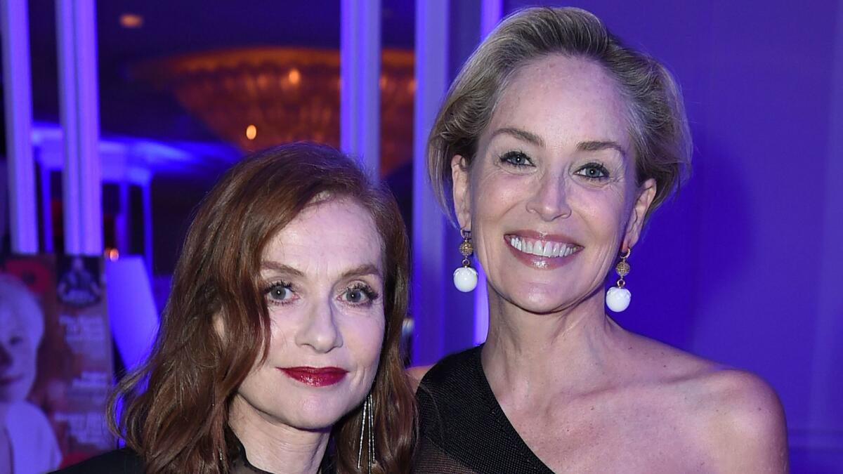 Academy Award nominee Isabelle Huppert, left, and Sharon Stone attend the 16th annual AARP Movies for Grownups Awards at the Beverly Wilshire Hotel on Feb. 6.