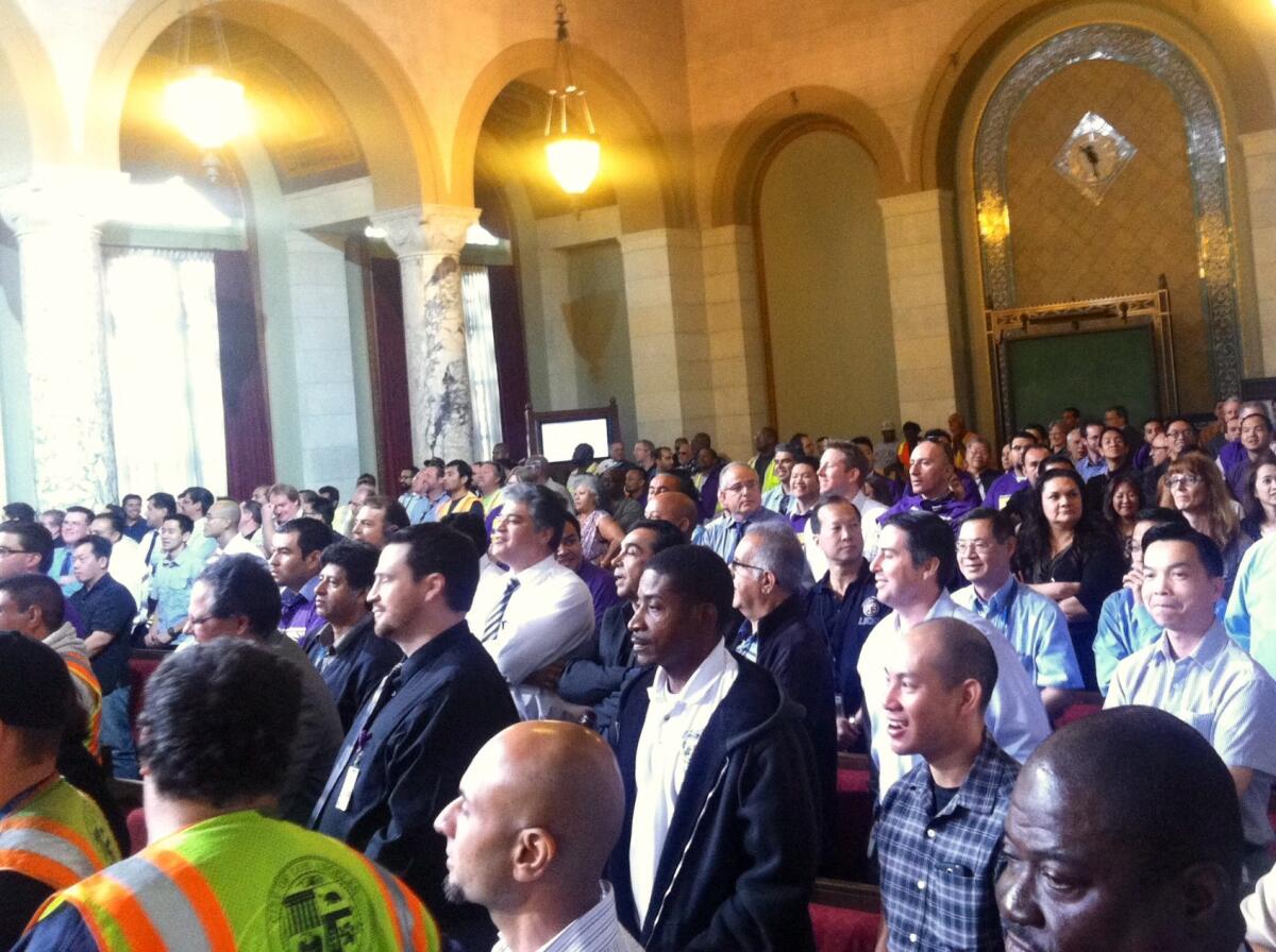 Los Angeles transportation department employees, including engineers and maintenance staff, packed City Hall to protest management policies.