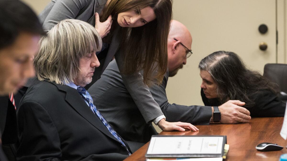 A judge on Wednesday ordered David and Louise Turpin, shown in court today, to have no contact with their 13 children.