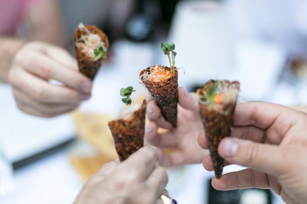 Spago's spicy tuna tartare in tuile cones.