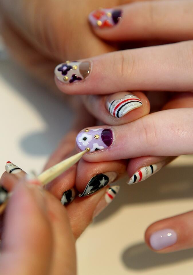 Whether it was tiny Union Jacks, tuxedos, stripes, crystal flowers or caviar pearls, nail art went from the subculture sidelines to becoming an everyday indulgence, and not just for flamboyant pop stars like Nicki Minaj and Lady Gaga. The boom was due, in part, to nail technology advances, including new, easy-to-apply nail decals and gel-color manicures, which allow for long-lasting decoration, including gradated glitter and stripes, as well as crystal and charm appliques.