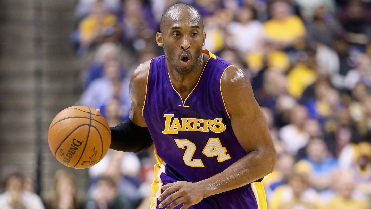 Lakers star Kobe Bryant dribbles the ball during a 110-91 loss to the Indiana Pacers on Monday.