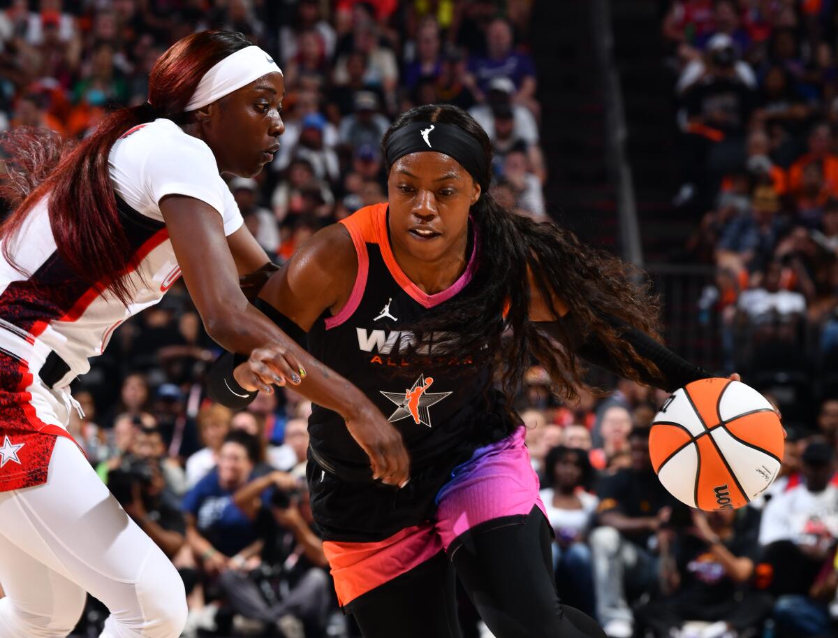 Arike Ogunbowale of Team WNBA drives to the basket during a 117-109 victory over the U.S. Olympic team.