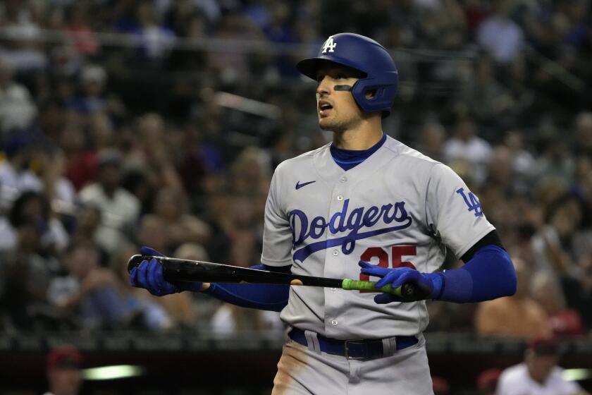 Los Angeles Dodgers left fielder Trayce Thompson (25) in the first inning during a baseball game against the Arizona Diamondbacks, Monday, Sept. 12, 2022, in Phoenix. (AP Photo/Rick Scuteri)