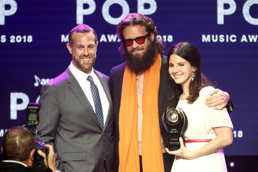 BEVERLY HILLS, CA - APRIL 23: Jason Silberman, L, Father John Misty and Lana Del Rey attends 35th Annual ASCAP Pop Music Awards at The Beverly Hilton Hotel on April 23, 2018 in Beverly Hills, California. (Photo by Frederick M. Brown/Getty Images for ASCAP)