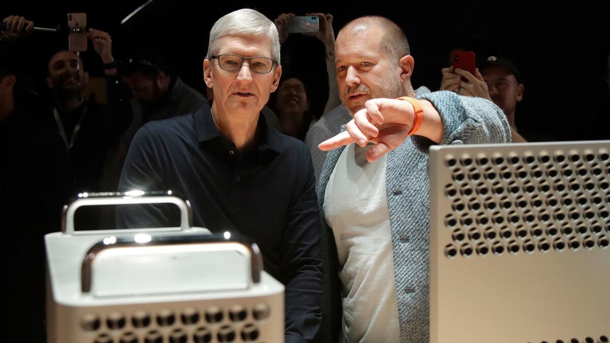 Apple's chief design officer, Jony Ive, right, and Chief Executive Tim Cook at the 2019 Apple Worldwide Developer Conference on June 3.