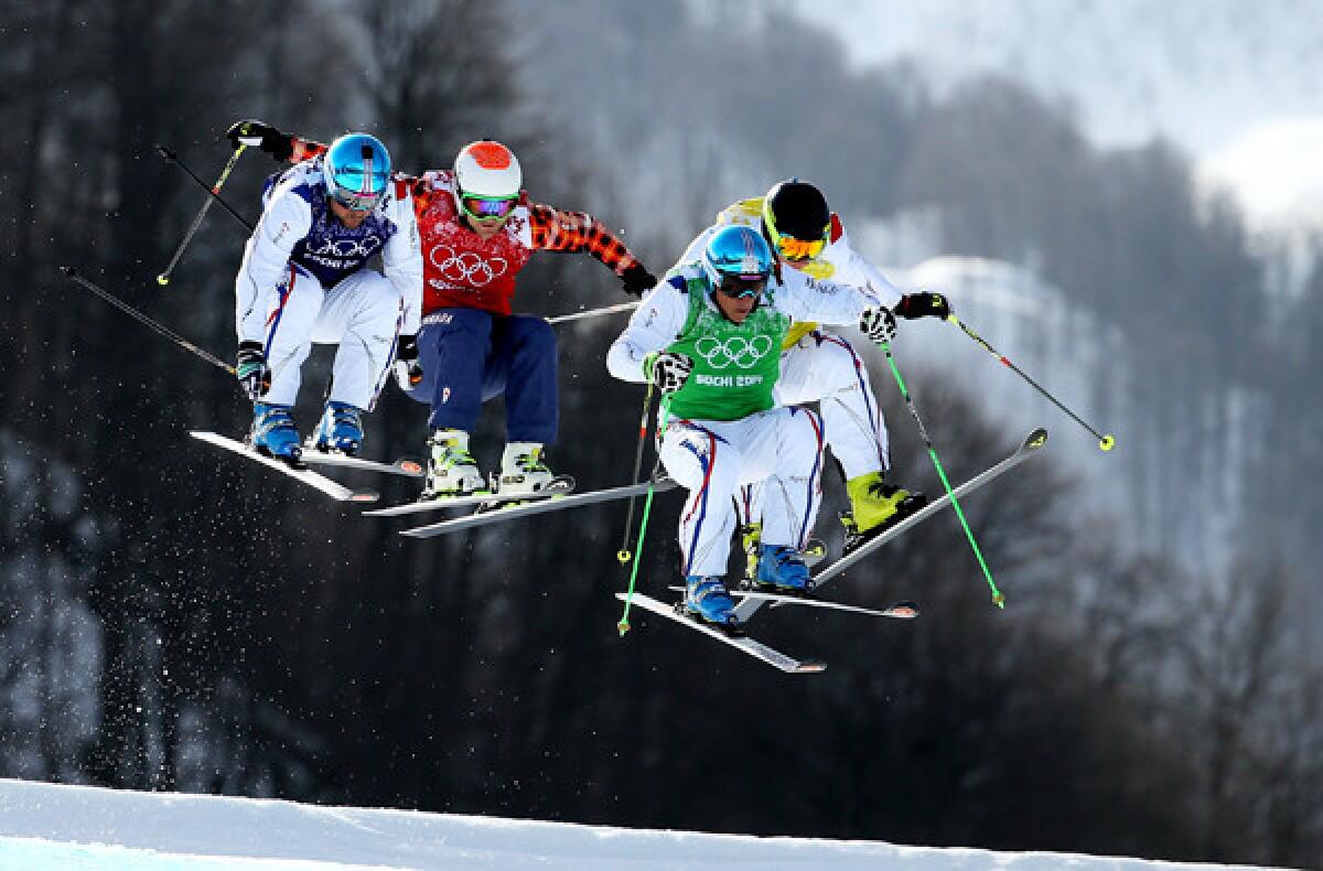 Gold medalist Jean Frederic Chapuis (green) leads the pack in the ski cross final on Thursday at the Sochi Olympics.