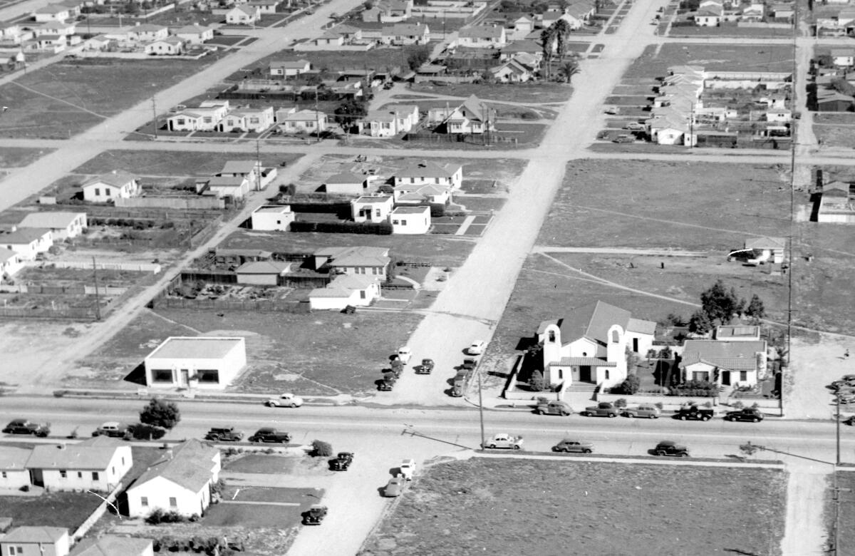 This 1945 Howard Rozelle aerial shows the original Saint Brigid church at Cass and Missouri streets.