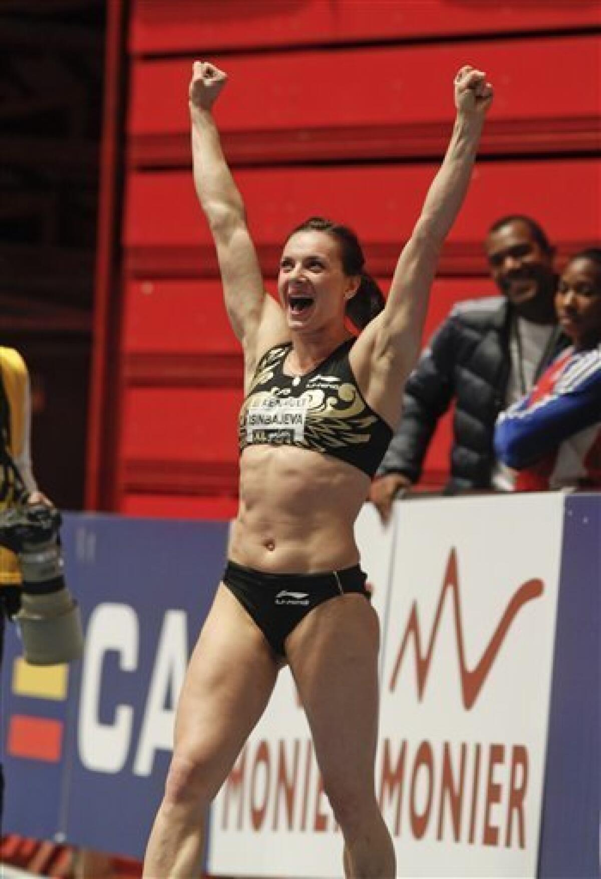 Yelena Isinbayeva of Russia reacts as she wins the women's pole vault during the XL-Galan Indoor athletics meeting in Stockholm, Sweden, Thursday Feb. 23, 2012. (AP Photo / Fredrick Persson) SWEDEN OUT