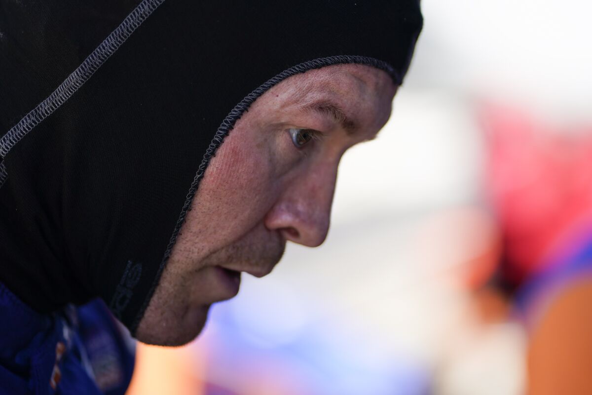 Scott Dixon, of New Zealand, waits in his pit box during practice for the Indianapolis 500 auto race at Indianapolis Motor Speedway, Tuesday, May 17, 2022, in Indianapolis. (AP Photo/Darron Cummings)