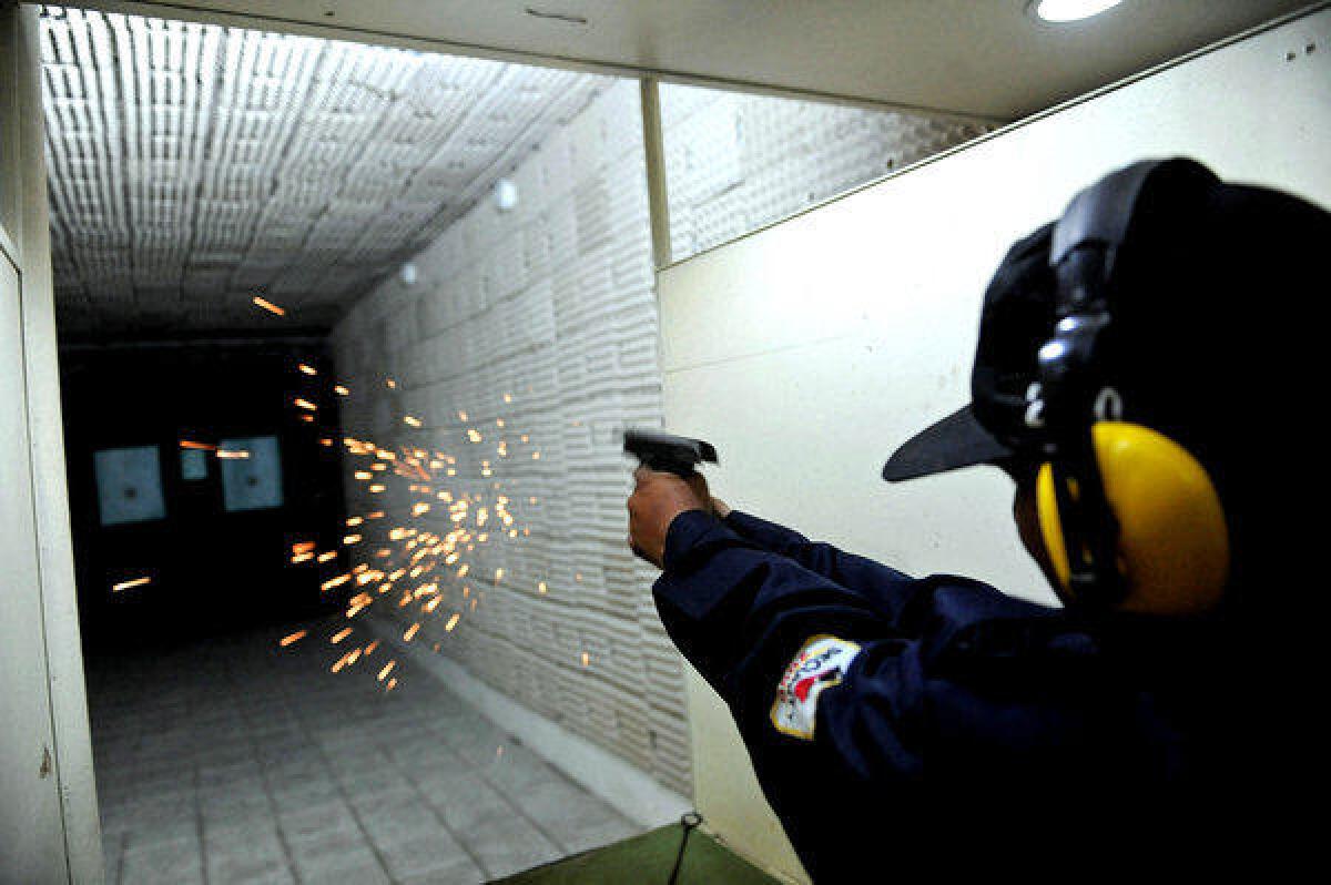 A Pakistani guard with a private security firm practices at a shooting range in Karachi. The port city is a buzzing hub of beaches, malls, restaurants -- and the odd shooting range where an army of private security guards train to protect the city's well-heeled. As growing insecurity grips the nation, with the military battling Taliban militants in swaths of the northwest and crime on the rise, the security industry is thriving.