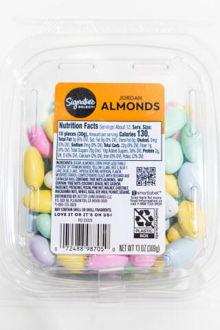 LOS ANGELES, CA, DECEMBER 26, 2024: Store bought grocery items that contain red dye #3, including Signature Select Jordan almonds, are photographed at the Los Angeles Times on December 26, 2024. High doses of red dye #3 were found to cause cancer in lab animals decades ago. A federal law known as the Delaney Clause says no compound shown to cause cancer in animals or humans can be in the food supply. The FDA acknowledged the cancer studies decades ago and used the findings to deny a request to approve the dye's use in cosmetics, however, red #3 was already being used in food, and for some reason its authorization has not yet been revoked. (Christina House / Los Angeles Times)
