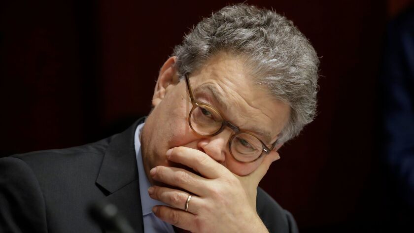 Sen. Al Franken, D-Minn., listens at a committee hearing at the Capitol in Washington on June 21.