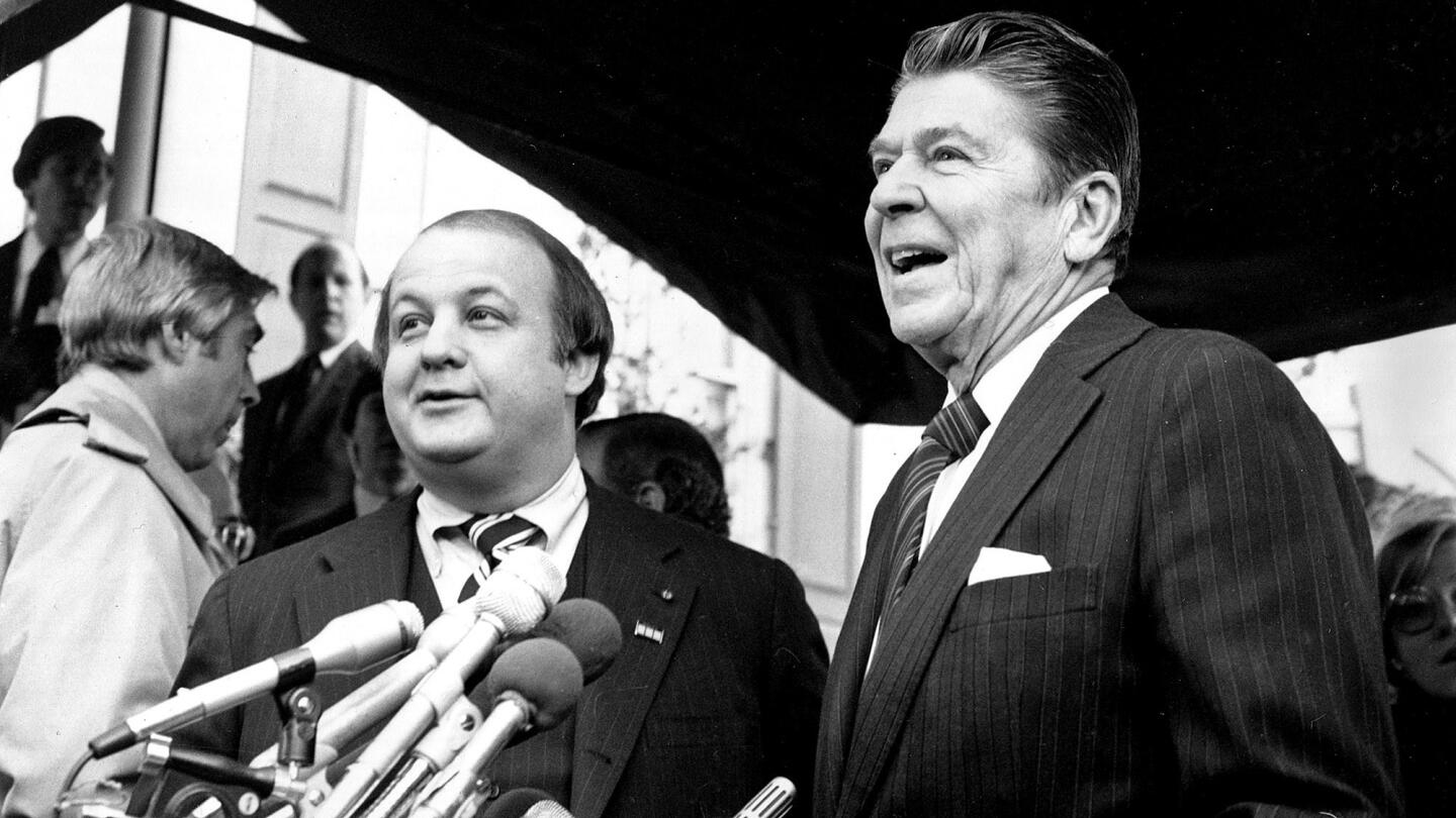 President-elect Ronald Reagan, right, introduces James Brady as his press secretary in Washington, D.C., on Jan. 6, 1981.
