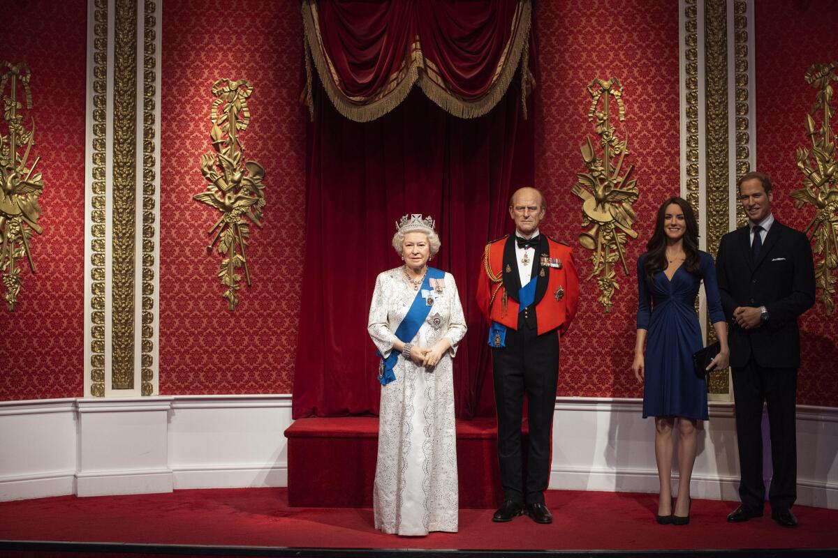 The empty space left after the figures of Britain's Prince Harry and Meghan, Duchess of Sussex, were removed Thursday at Madame Tusssauds London.