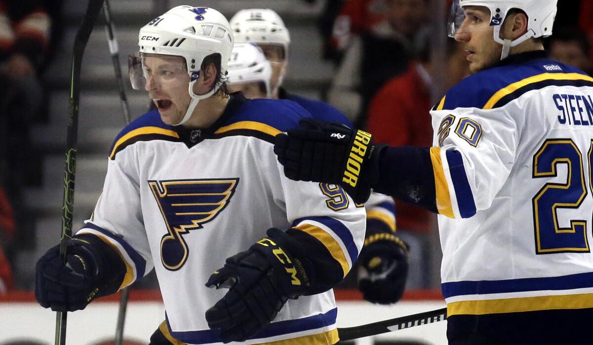 St. Louis Blues right wing Vladimir Tarasenko, left, celebrates with left wing Alexander Steen after scoring his second goal against the Chicago Blackhawks in Game 4 of the first-round Stanley Cup playoff series on Tuesday.