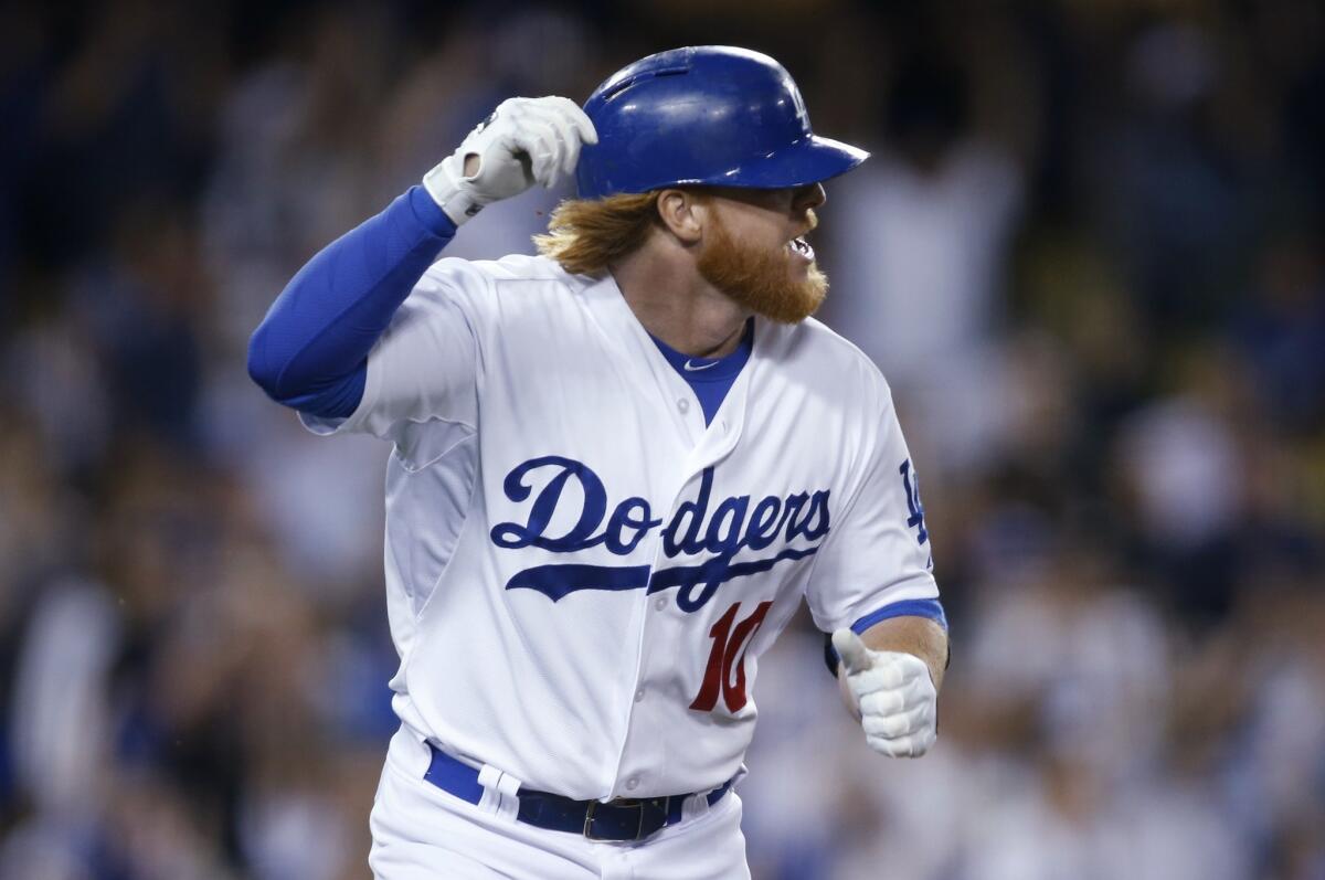 Justin Turner's pinch-hit single drove in Juan Uribe and gave the Dodgers a 1-0 victory over the St. Louis Cardinals on Thursday at Dodger Stadium.