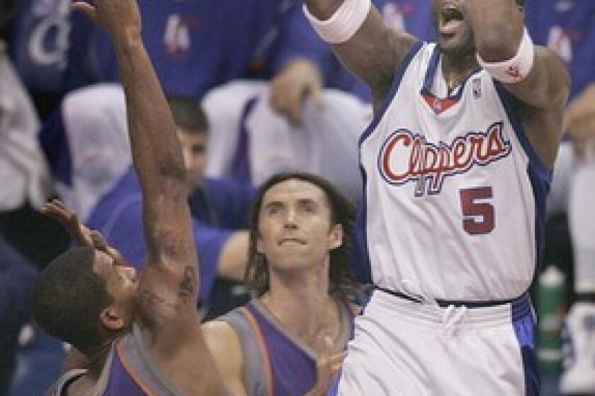 Clippers Cuttino Mobley makes this shot over Suns in game 3 of the 2nd round Western Conference NBA playoffs at Staples Center.