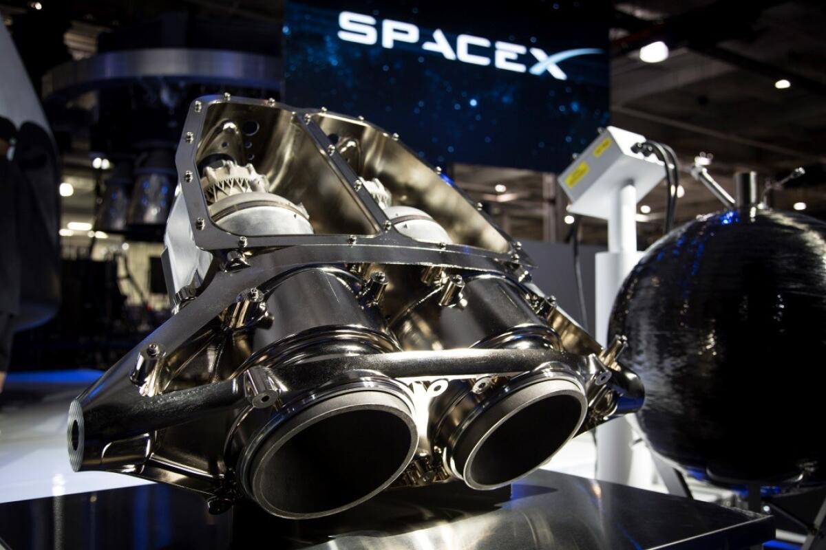Part of the SuperDraco engine used by SpaceXs Cargo Dragon spacecraft was 3-D printed. (SpaceX)