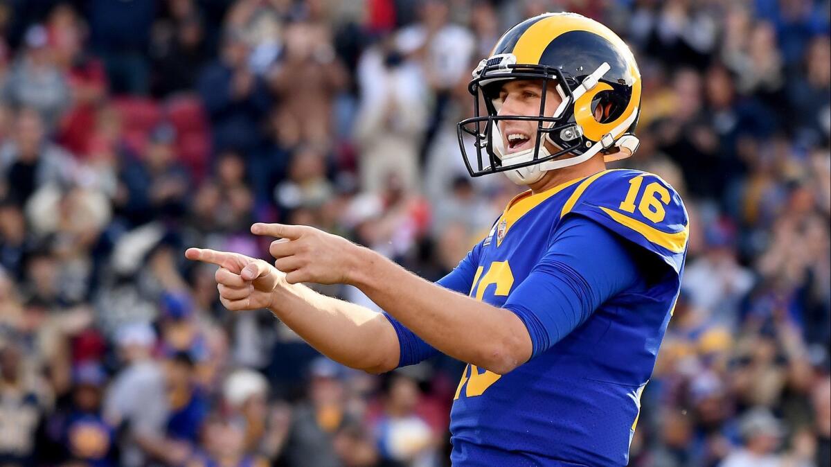 Rams quarterback Jared Goff celebrates his touchdown pass to Brandin Cooks against the 49ers in the second quarter at the Coliseum during their Week 17 game.