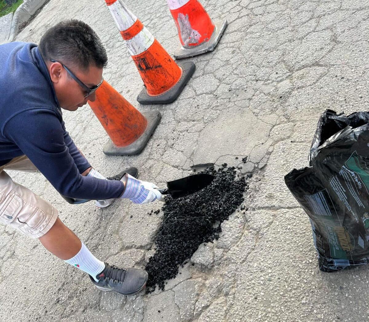 A Compton couple fixed neighborhood potholes. The city has ordered them to stop