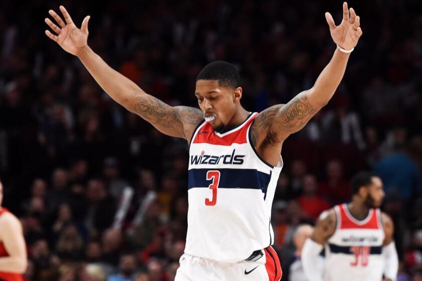 Washington Wizards guard Bradley Beal reacts after hitting a shot during the second half of the team's NBA basketball game against the Portland Trail Blazers in Portland, Ore., Tuesday, Dec. 5, 2017. Beal scored 51 points as the Wizards won 106-92 (AP Photo/Steve Dykes)