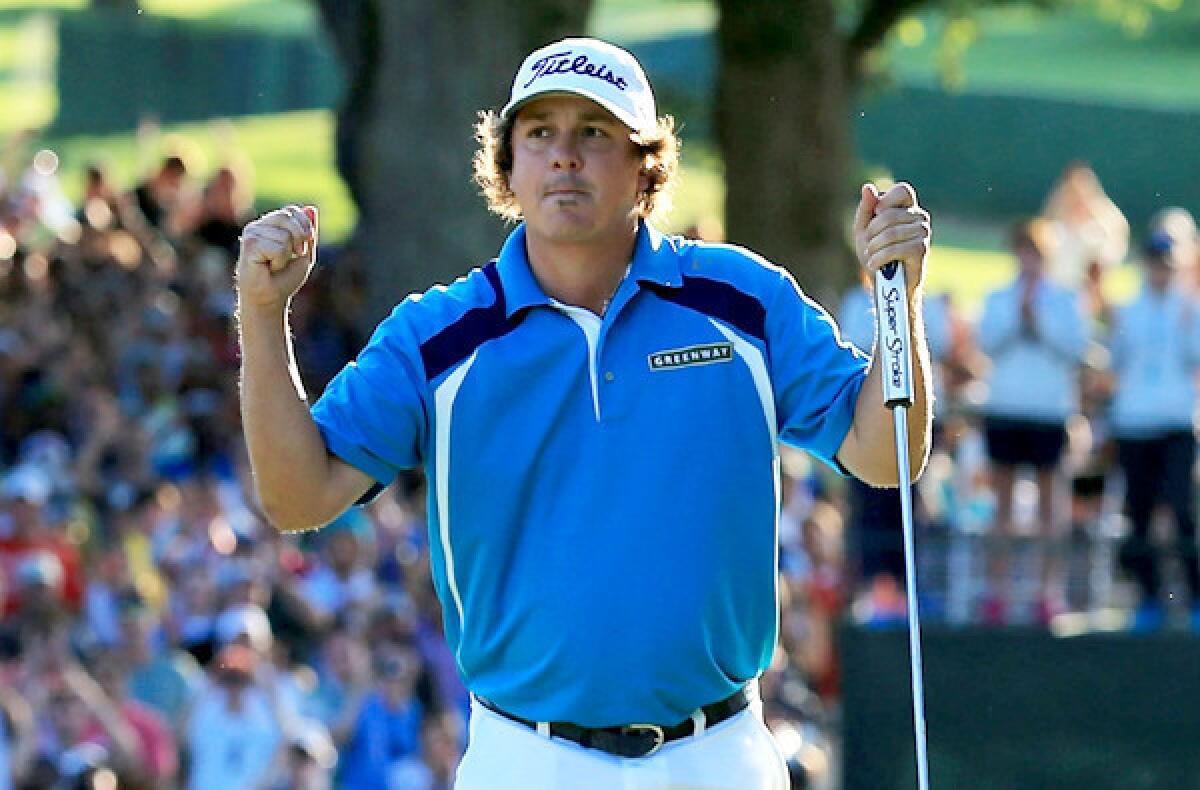 Jason Dufner reacts after tapping in his final putt at No. 18 to clinch the victory in the PGA Championship on Sunday at Oak Hill Country Club.