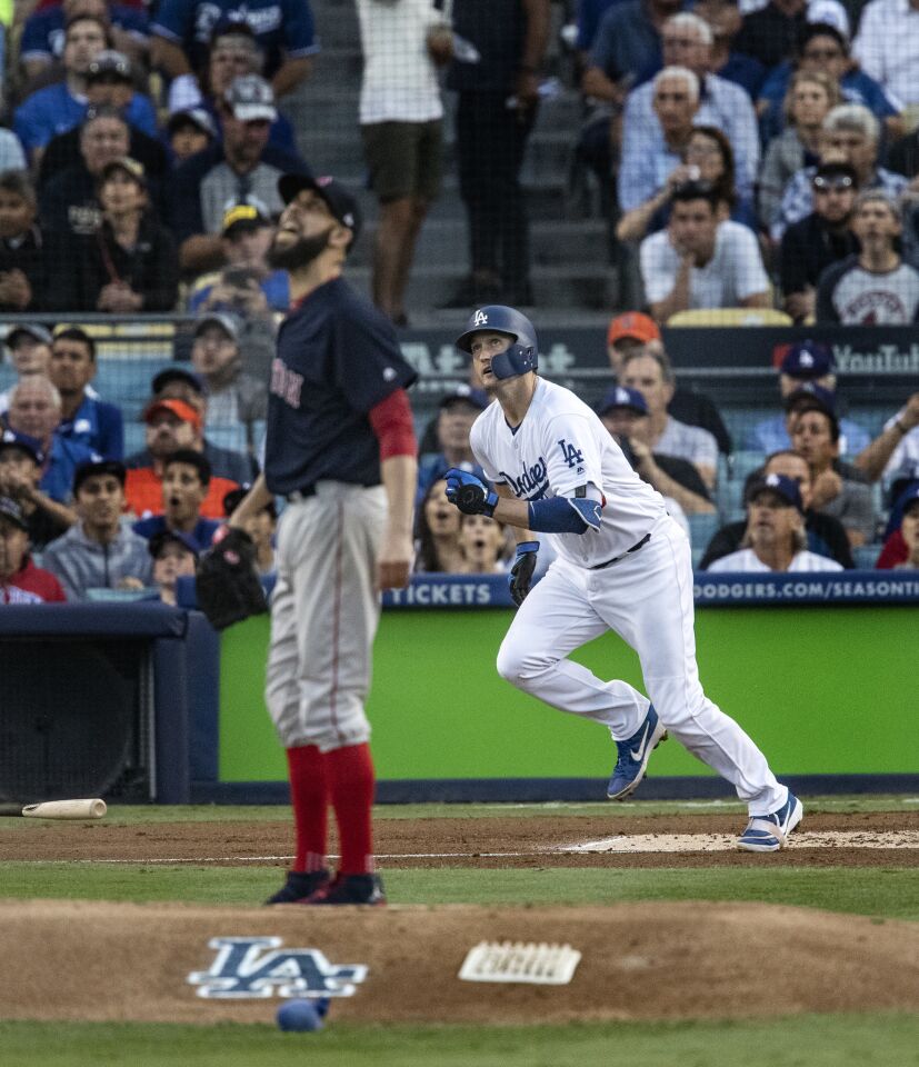 Red Sox starting pitcher David Price grimaces as Dodgers first baseman David Freese hits a solo homer in the first inning.