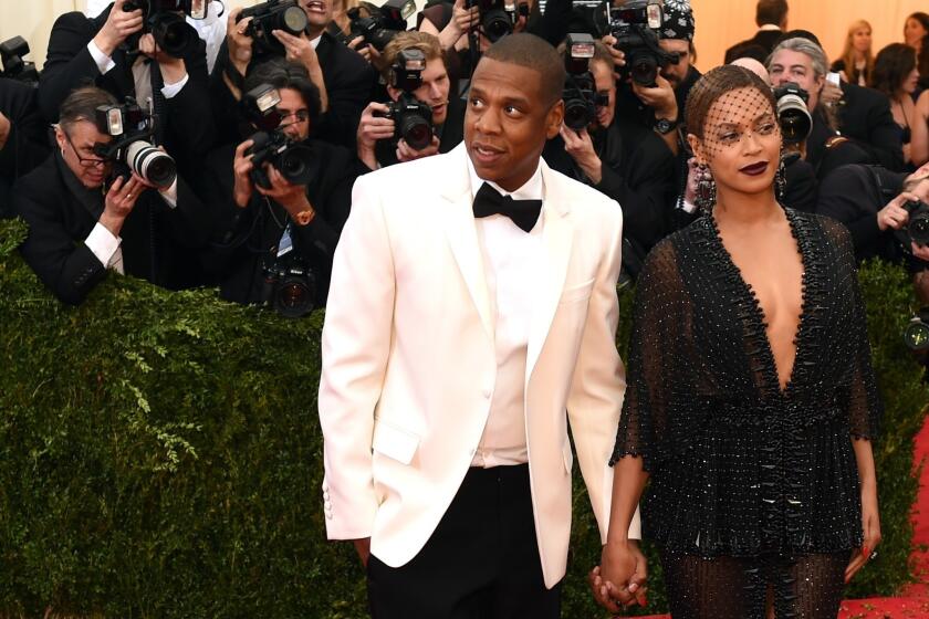 Jay Z and Beyonce arrive at the Costume Institute Benefit at The Metropolitan Museum in New York in May.