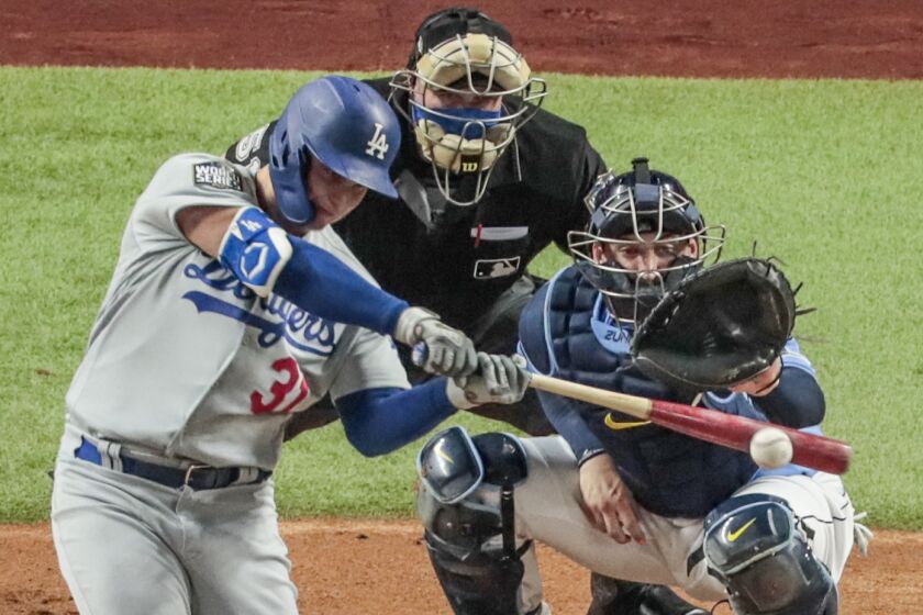 Dodgers outfielder Joc Pederson hits a home run against the Tampa Bay Rays during Game 5 of the World Series.