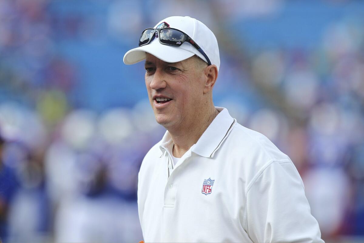 Hall of Fame quarterback Jim Kelly says he's cancer free three months after completing radiation and chemotherapy treatments.