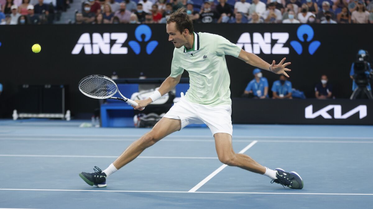 Daniil Medvedev plays a backhand return during his victory over Nick Kyrgios in the second round of the Australian Open.