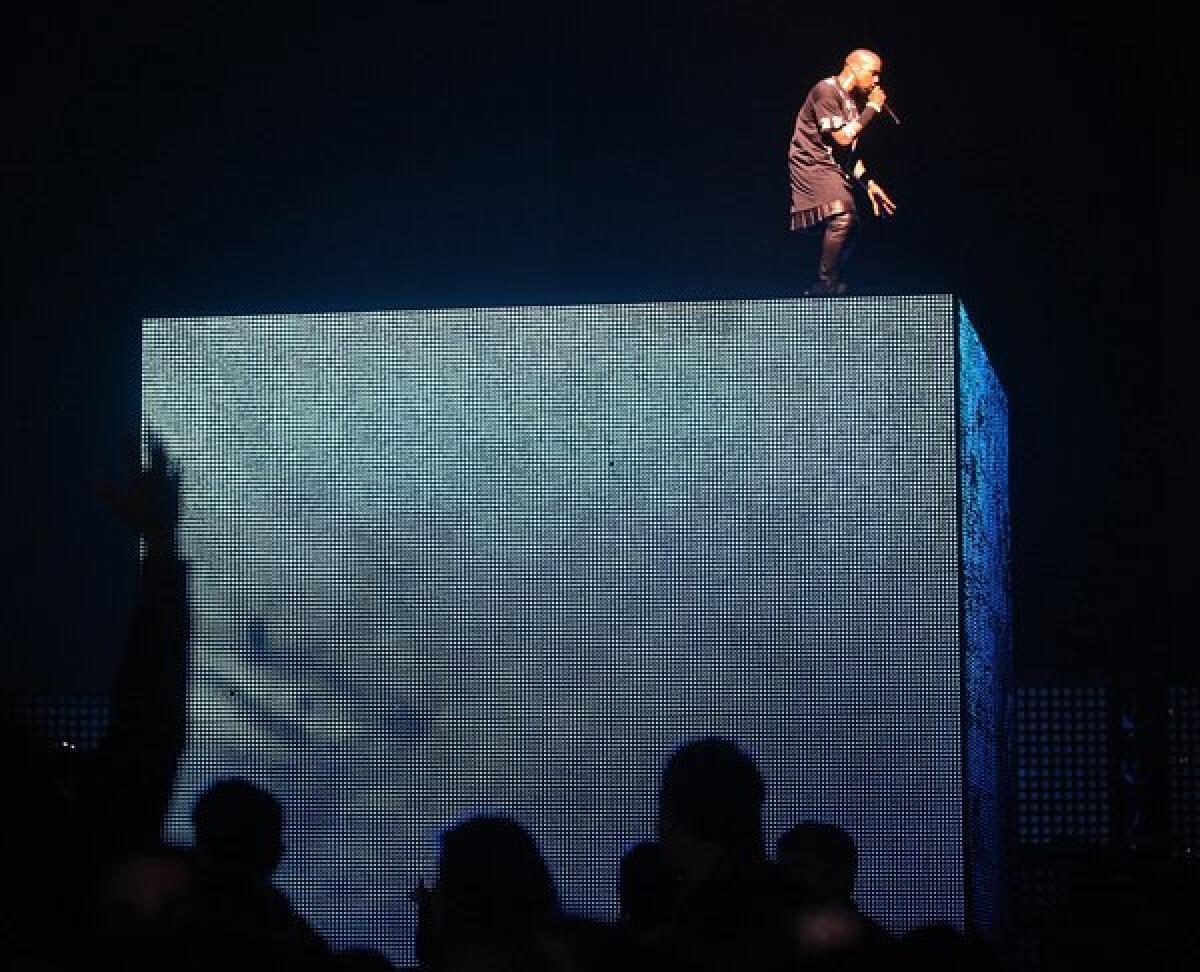 Kanye West on stage at Staples Center Sunday night December 11 2011 for his 'Watch The Throne' tour with Jay¿Z in Los Angeles, the first of three nights.