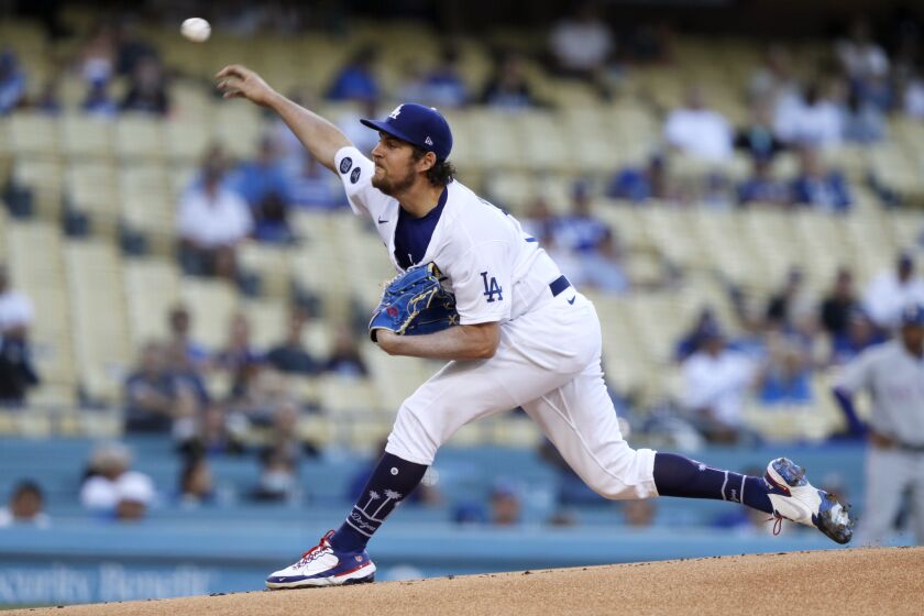 Dodgers starter Trevor Bauer delivers in the first inning against the Texas Rangers on Saturday, June 12, 2021.