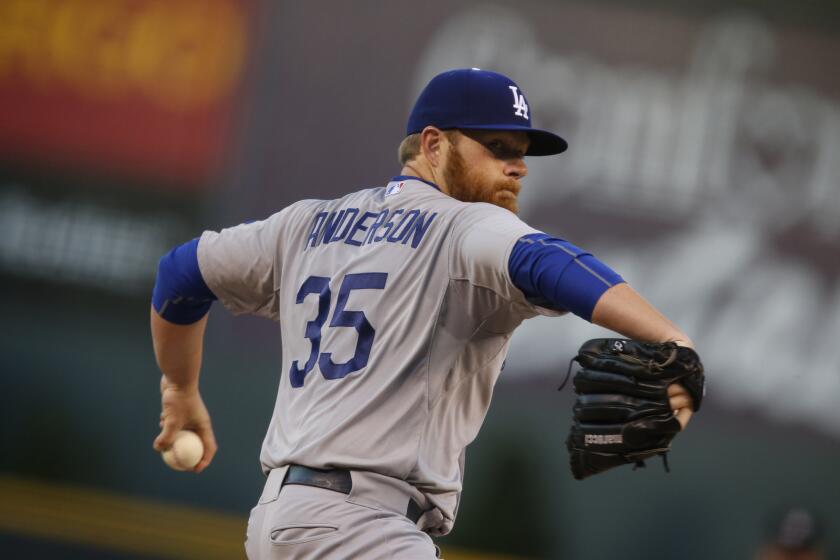 Dodgers starting pitcher Brett Anderson works against the Rockies in the first inning of a game on Sept. 26.