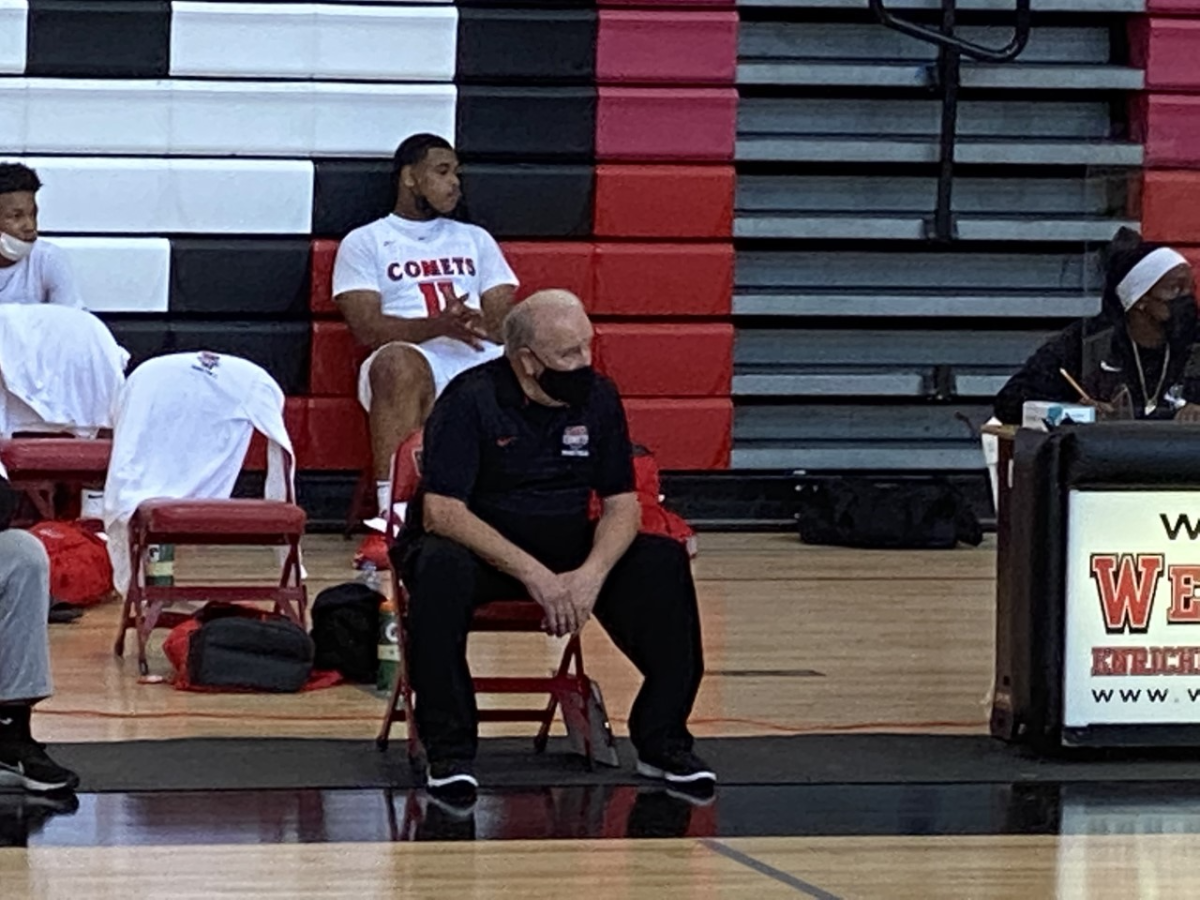 Westchester coach Ed Azzam watches players from the sidelines.