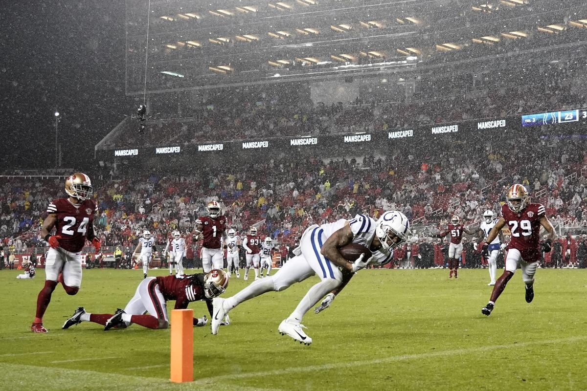 Indianapolis Colts wide receiver Michael Pittman Jr., foreground, 