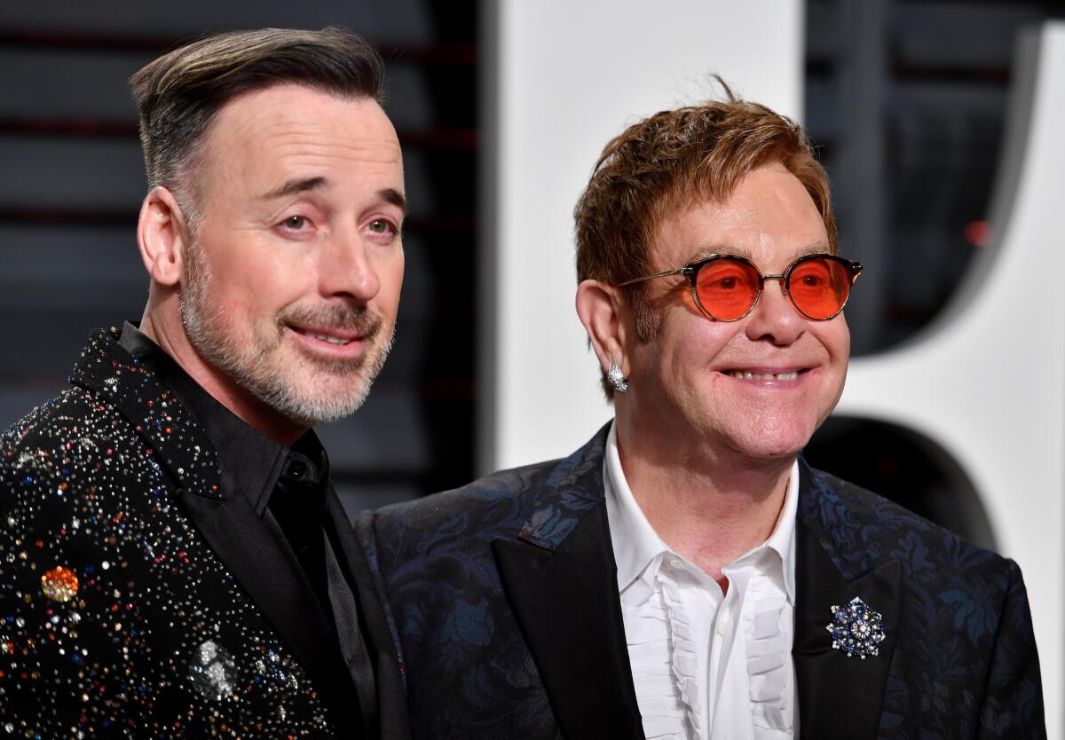 David Furnish and Elton John. (Pascal Le Segretain / Getty Images)