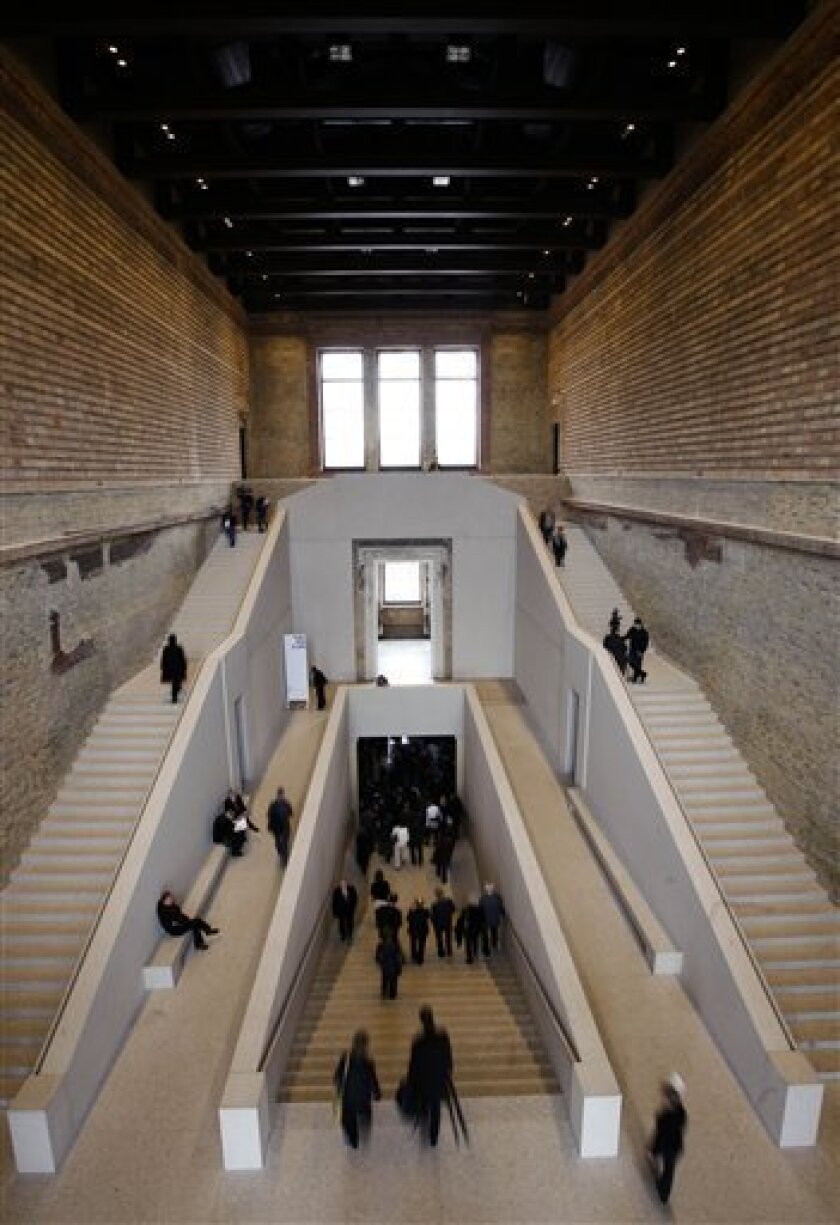 An interior view of the staircase of the historical "Neue Museum", or New Museum, on the so called Museum Island in Berlin, on Thursday, March 5, 2009. The building is being handed over to city museum officials on Thursday after a decade of painstaking restoration work. That marks a major step forward in a marathon project to revive the German capital's neoclassical Museum Island complex. The plans for the reconstruction were made by British architect David Chipperfield. The museum houses, as it did before the war, Berlin's Egyptian collection(AP Photo/Markus Schreiber)