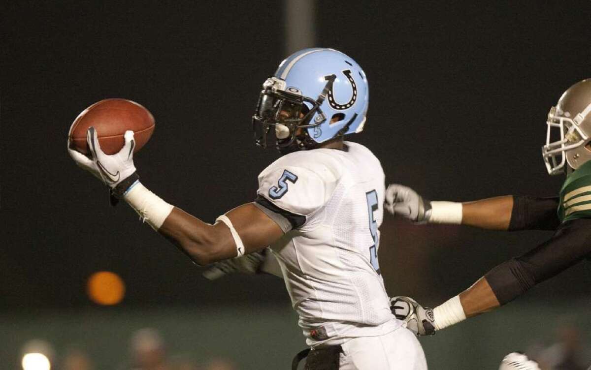 Freshman Darreus Rogers, shown here with Carson High in 2011, is excited to get on the field for the Trojans after not being able to enroll at USC last year because he was not cleared by the NCAA Eligibility Center.