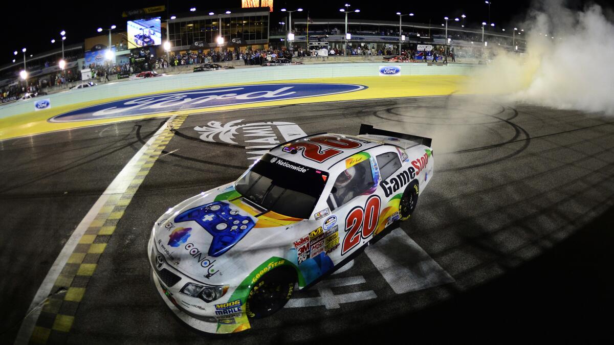 Matt Kenseth celebrates after winning Saturday's NASCAR Nationwide Series race at Homestead-Miami Speedway.