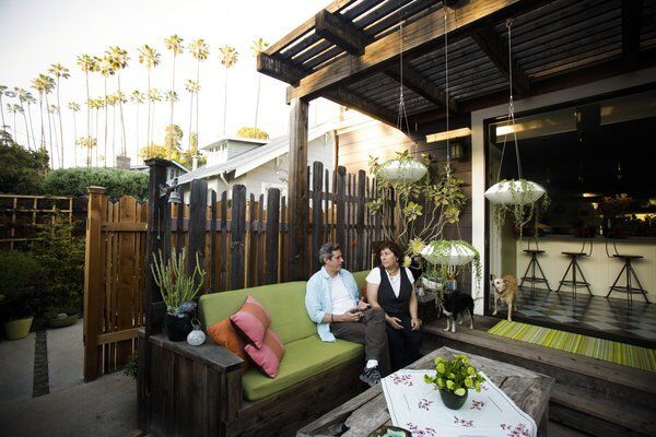 Annette Gutierrez, pictured with husband Gustavo, created an outdoor great room as an extension of the indoor kitchen. "I wanted it to feel like my front living room so you can walk out and just plop down and relax," Gutierrez said. "We use it all the time." For a tour of her outdoor living areas, keep clicking.