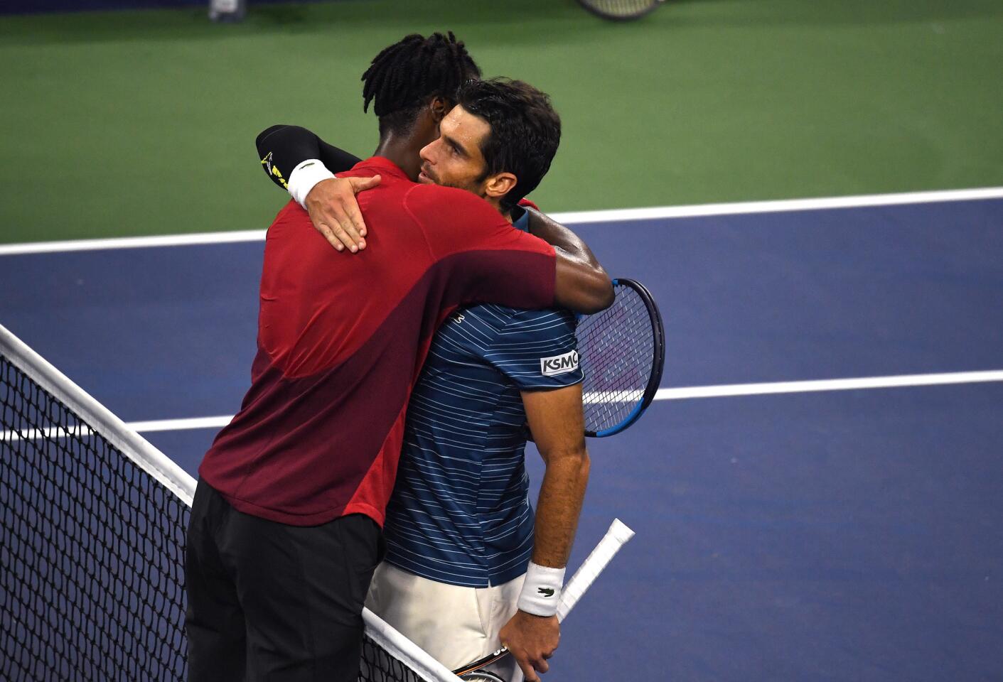 Gael Monfils of France, left, hugs Pablo Andujar of Spain following their Men's Singles fourth round match on day eight of the 2019 U.S. Open at the USTA Billie Jean King National Tennis Center on Sept. 2, 2019, in Queens.