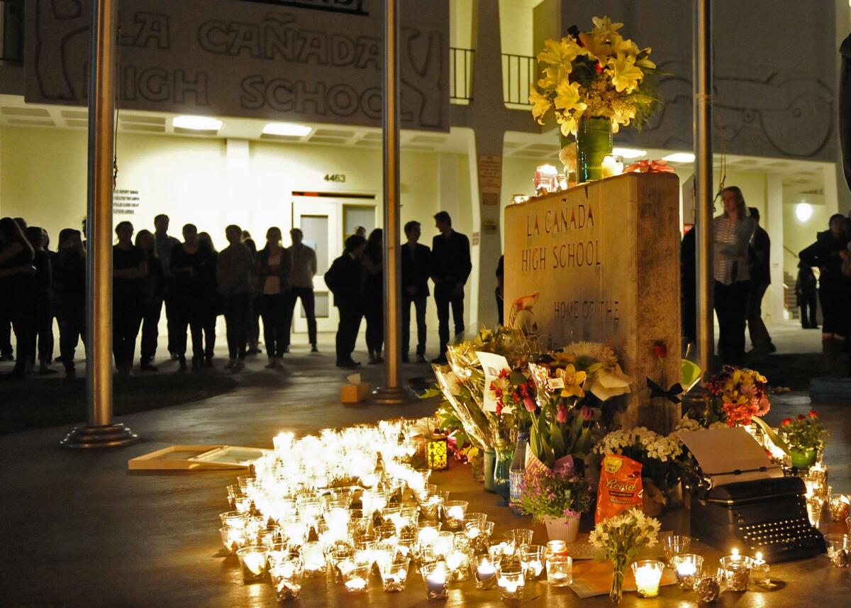Students and community members come together during a memorial for Campbell Taylor at La Canada High School on Saturday, March 2, 2013 in La Canada, Calif.