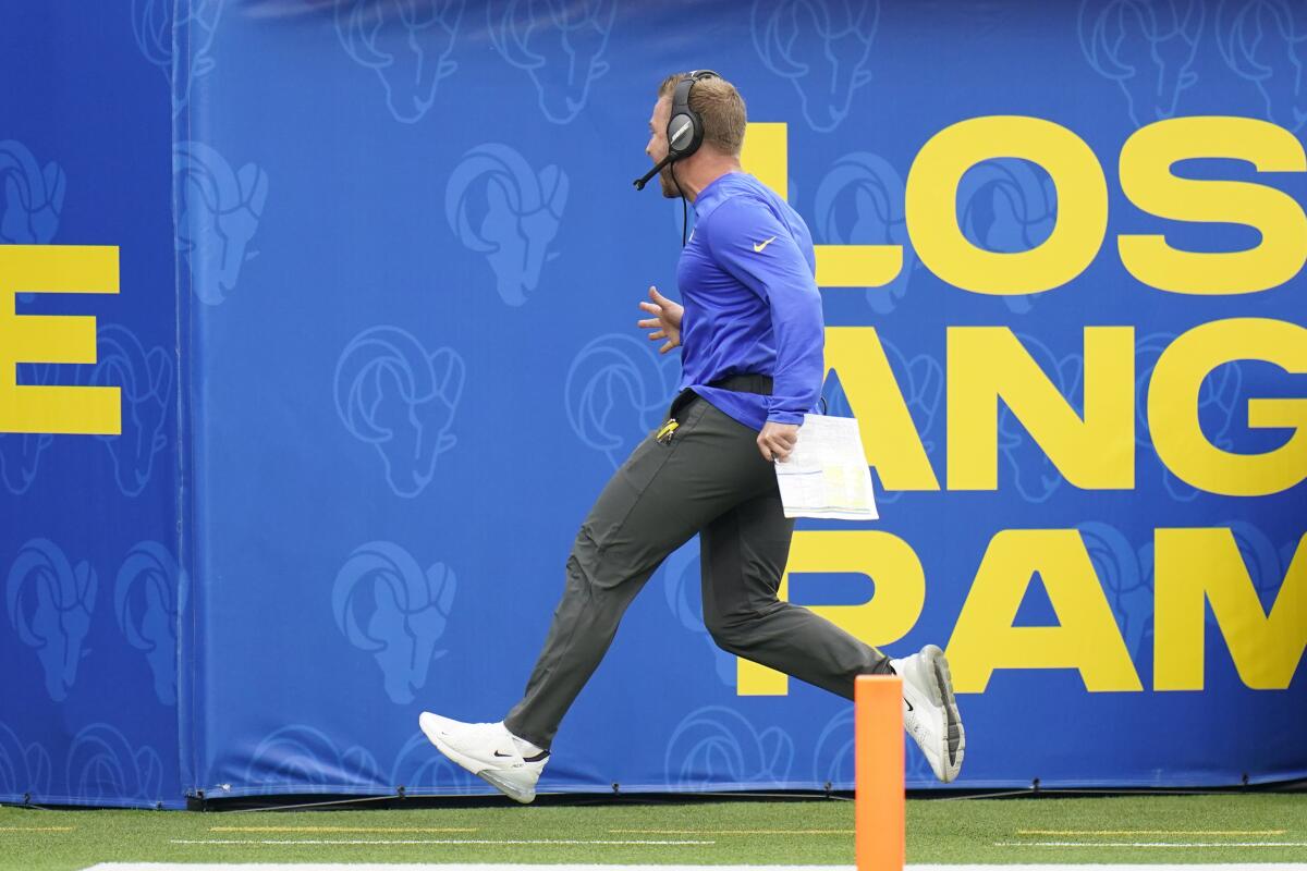 Rams head coach Sean McVay shows his excitement on the sideline after DeSean Jackson's touchdown catch.