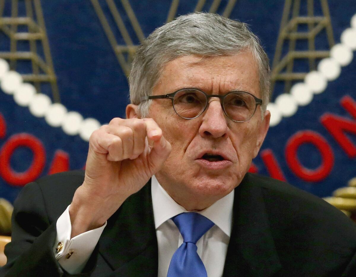 Federal Communications Commission Chairman Tom Wheeler speaks before voting on net neutrality regulations on Feb. 26. The rules were published in the Federal Register on Monday and a telecommunications industry trade group filed suit to stop them.