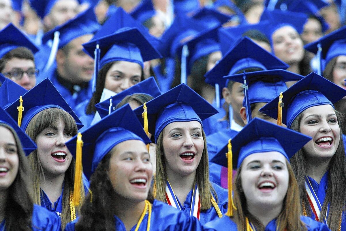 Students at Burbank High School will have to pay for extra tickets this year to recoup the cost of the ceremony. Pictured is the graduation ceremony from May 24, 2013, where students recited with principal Hani Yousseff, "always remember to pursue pride and excellence in everything you do"