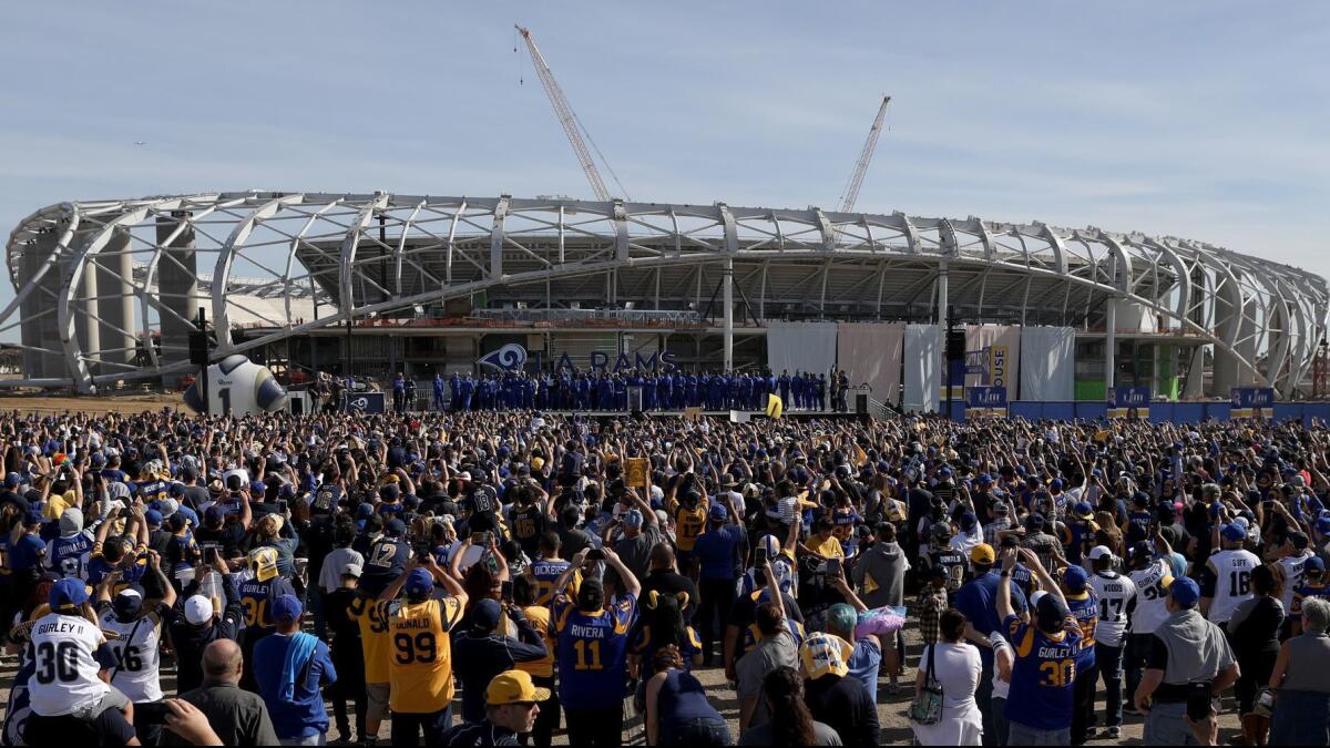 Fans gather at the Rams' future home in Inglewood to send the team off to Super Bowl LIII on Jan. 27.