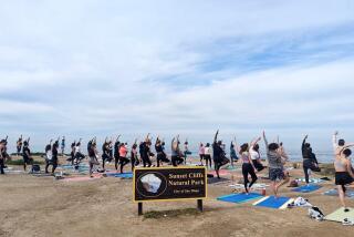 San Diego, California-Amy Baack teaches a free yoga class at Sunset Cliffs National Park in San Diego, California (Courtesy of Amy Baack)