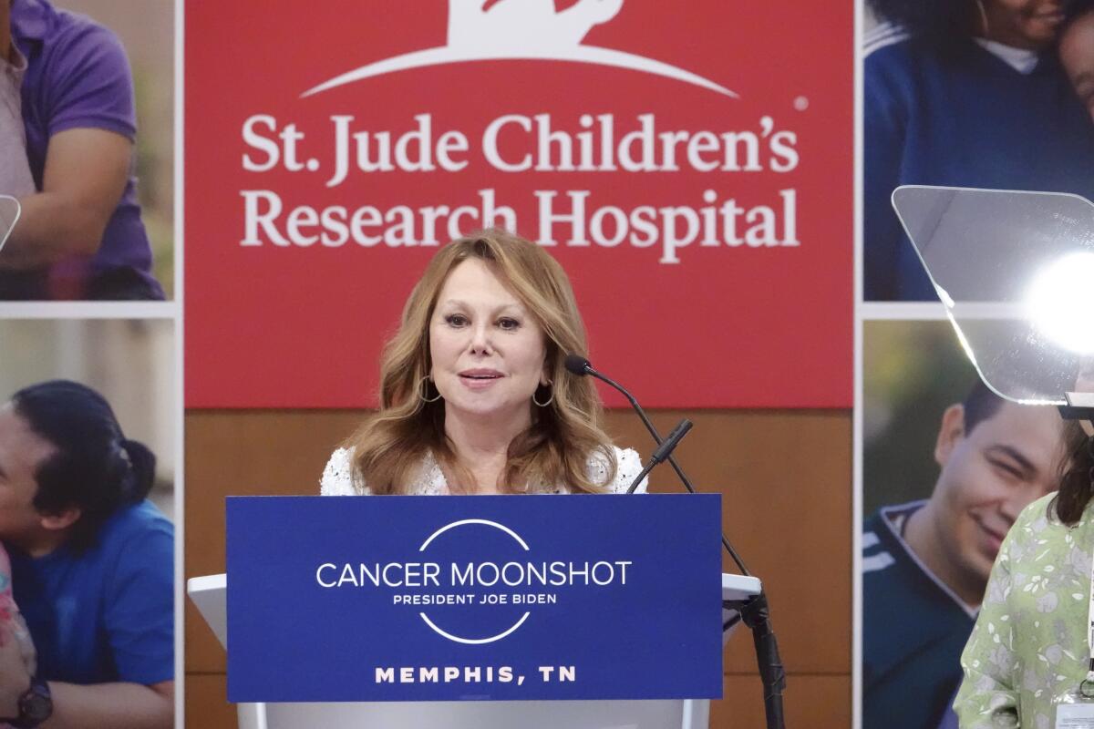 FILE - Marlo Thomas speaks before introducing first lady Jill Biden as she visits the St. Jude Children's Research Hospital on March 25, 2022, in Memphis, Tenn. The hospital said Wednesday, July 13, 2022, that they are increasing its investment by $1.4 billion for a strategic plan that includes programs advancing the study and treatment of pediatric cancer and other catastrophic diseases. (AP Photo/Karen Pulfer Focht, File)